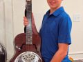 Joseph B is excited to learn dobro!  (Oct 2025)