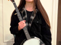 Emree A is excited to learn to play banjo! (Dec 2025)