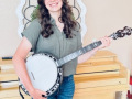 Emree is progressing quickly on her upgraded banjo! (Apr 2026)