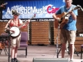 Riley Gilbreath & Jim Penson on stage at Acoustic Music Camp 2017