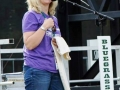 Guest M/C Julie Tompkins at Bloomin' Bluegrass Festival 2015. Photo by Bob Compere