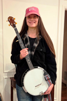Emree A is excited to learn to play banjo! (Dec 2025)