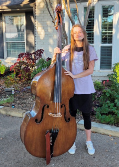 Emma H is learning to play on her upgraded bass! (Nov 2025)