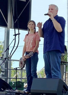Emma gets her new mandolin on stage at Wylie Jubilee 2025