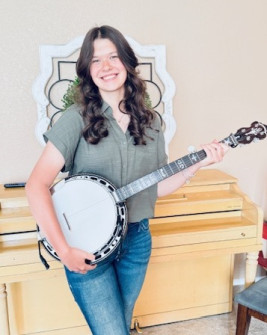 Emree is progressing quickly on her upgraded banjo! (Apr 2026)