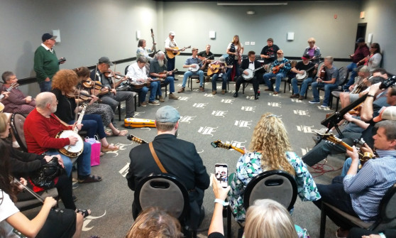 Jamming with Becky Buller Band at Bluegrass Heritage Festival 2019. Photo by Alan Tompkins.