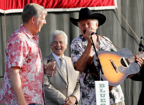 Presentation of the Bluegrass Star Award by Alan Tompkins to Del McCoury, with Peter Rowan. Photo by Nathanial Dalzell.