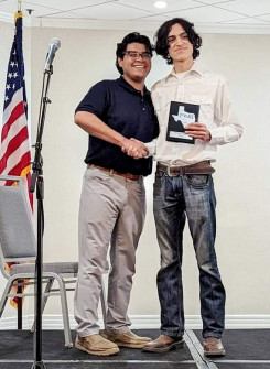 Izaak Mora, 2022 Banjo 2nd Place, and Championship Director Lucas White